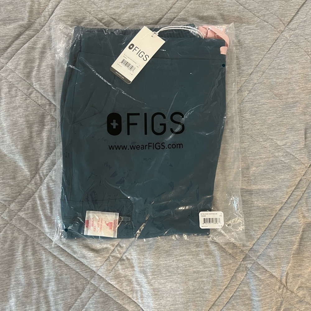 Figs Caribbean Blue Scrub Pants with light pink drawstring